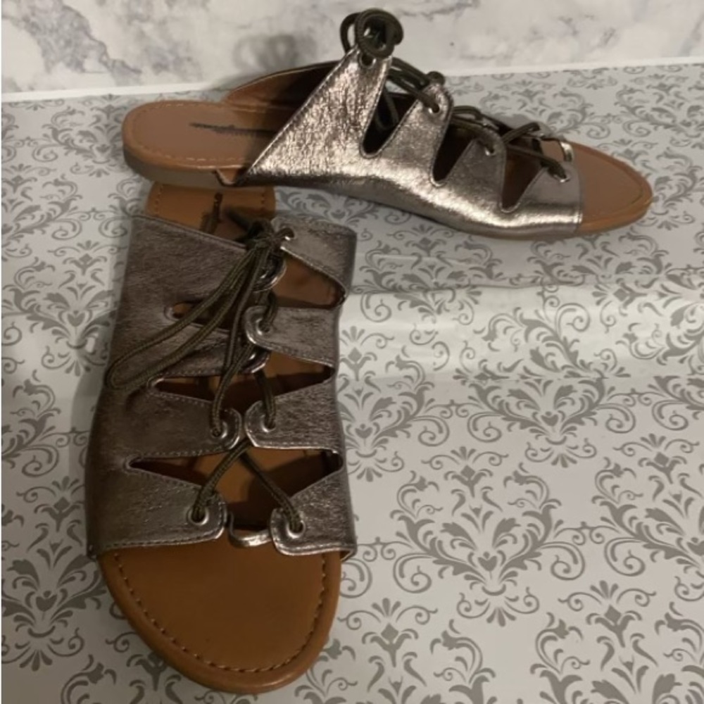 American eagle. Outfitters, slip on, metallic tone sandals .